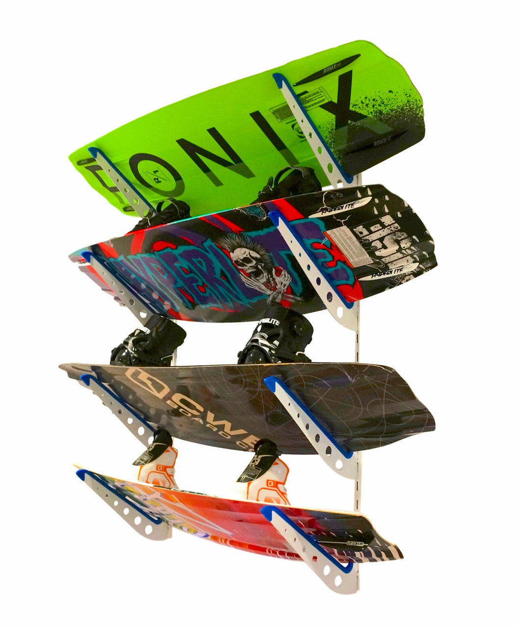 Four wakeboards stored on the white XSR wall racks