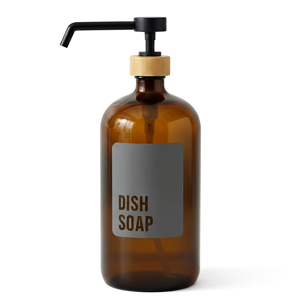 Amber glass dish soap dispenser with black pump and bamboo collar