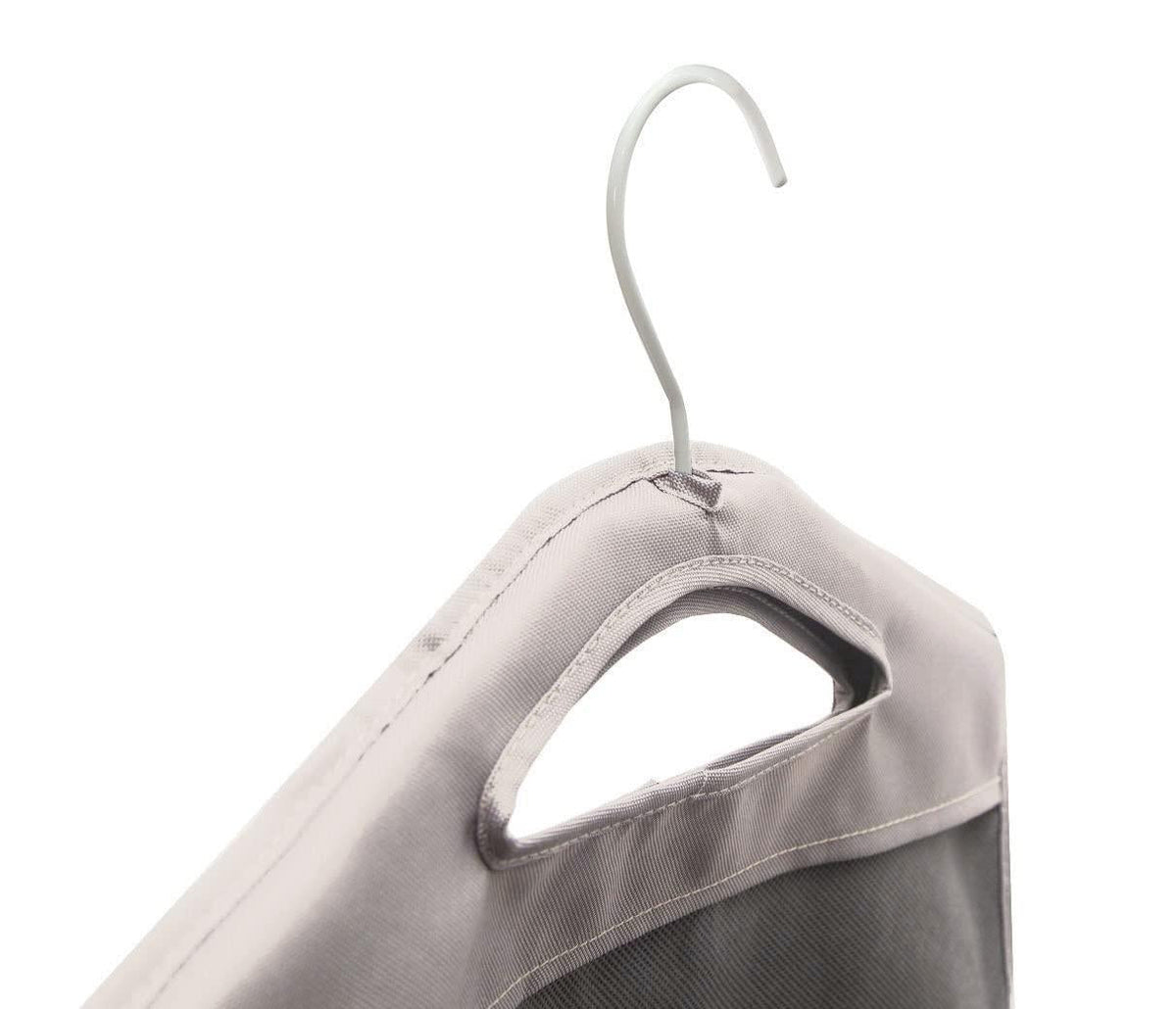 Close-up of the beige hamper's hanger hook and built-in carry handle