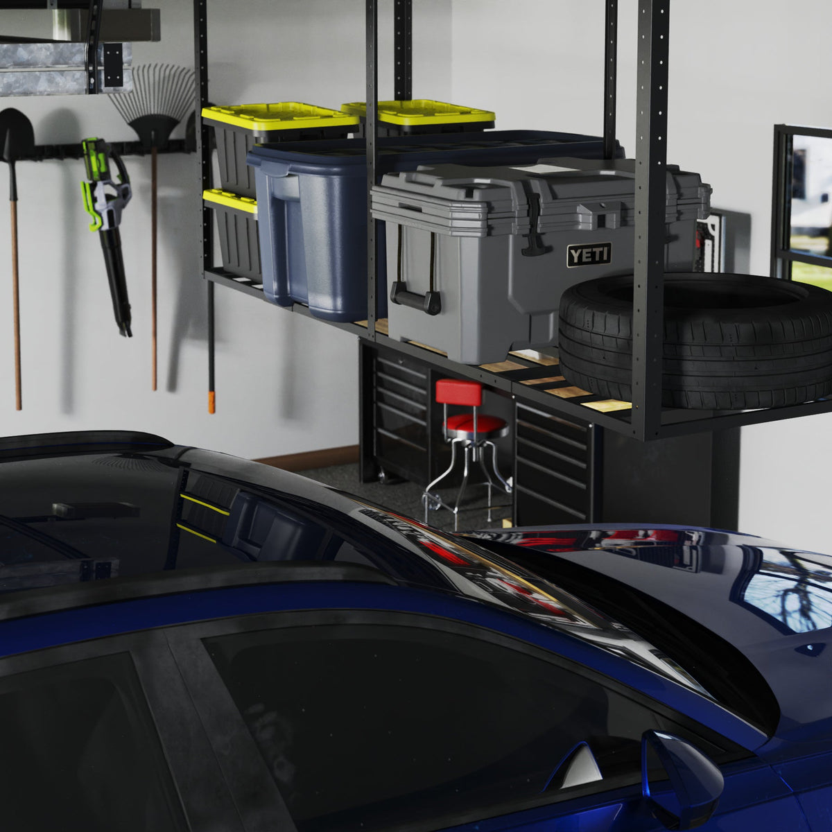Overhead ceiling rack with storage bins above a parked car in a garage
