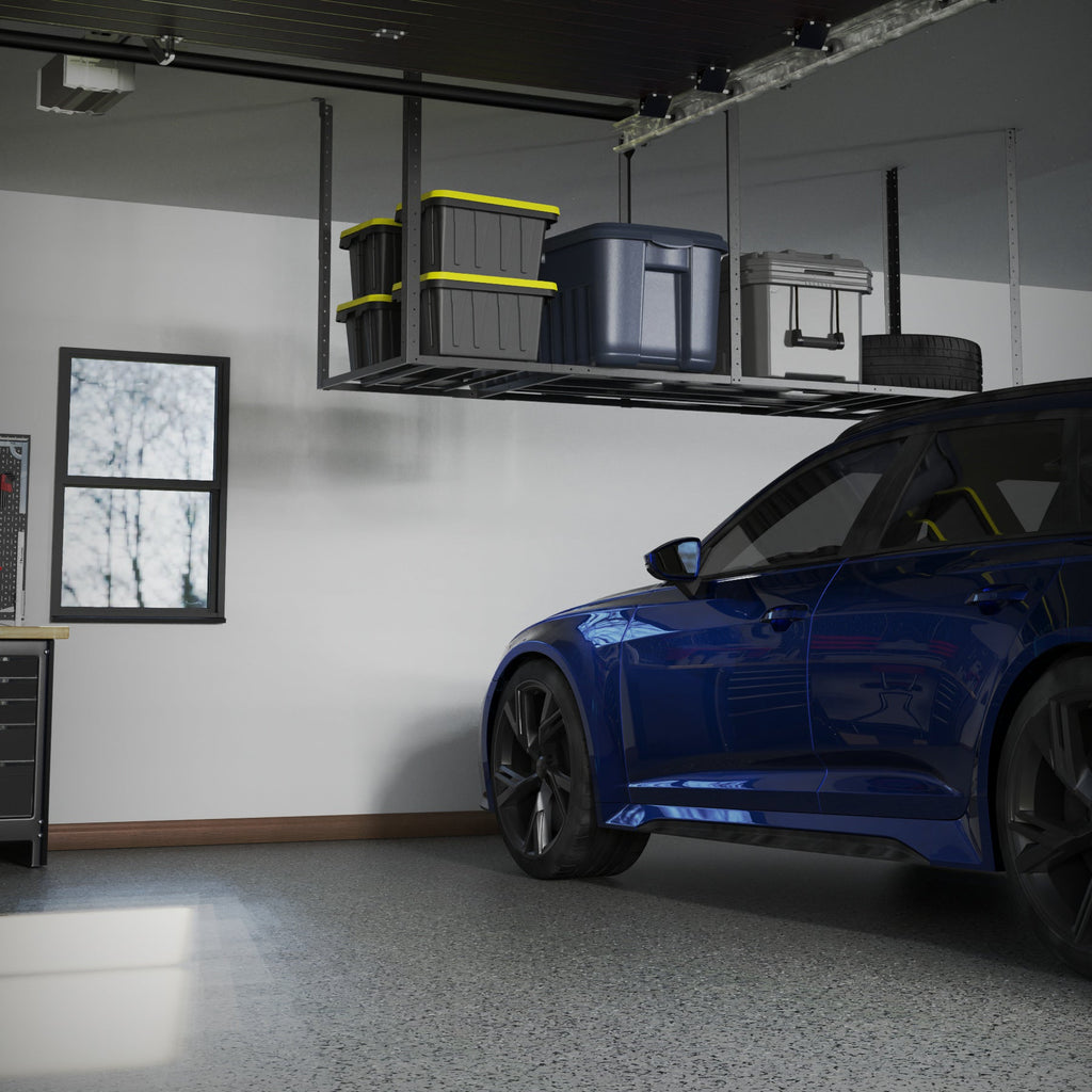 Overhead garage rack holding bins high above a parked car