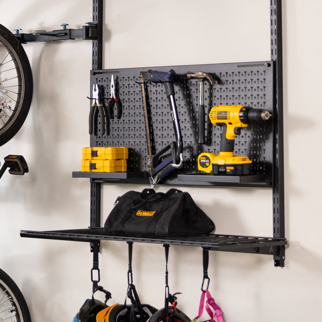 G-Storage Pro pegboard and shelves holding power tools, a tool bag and helmets