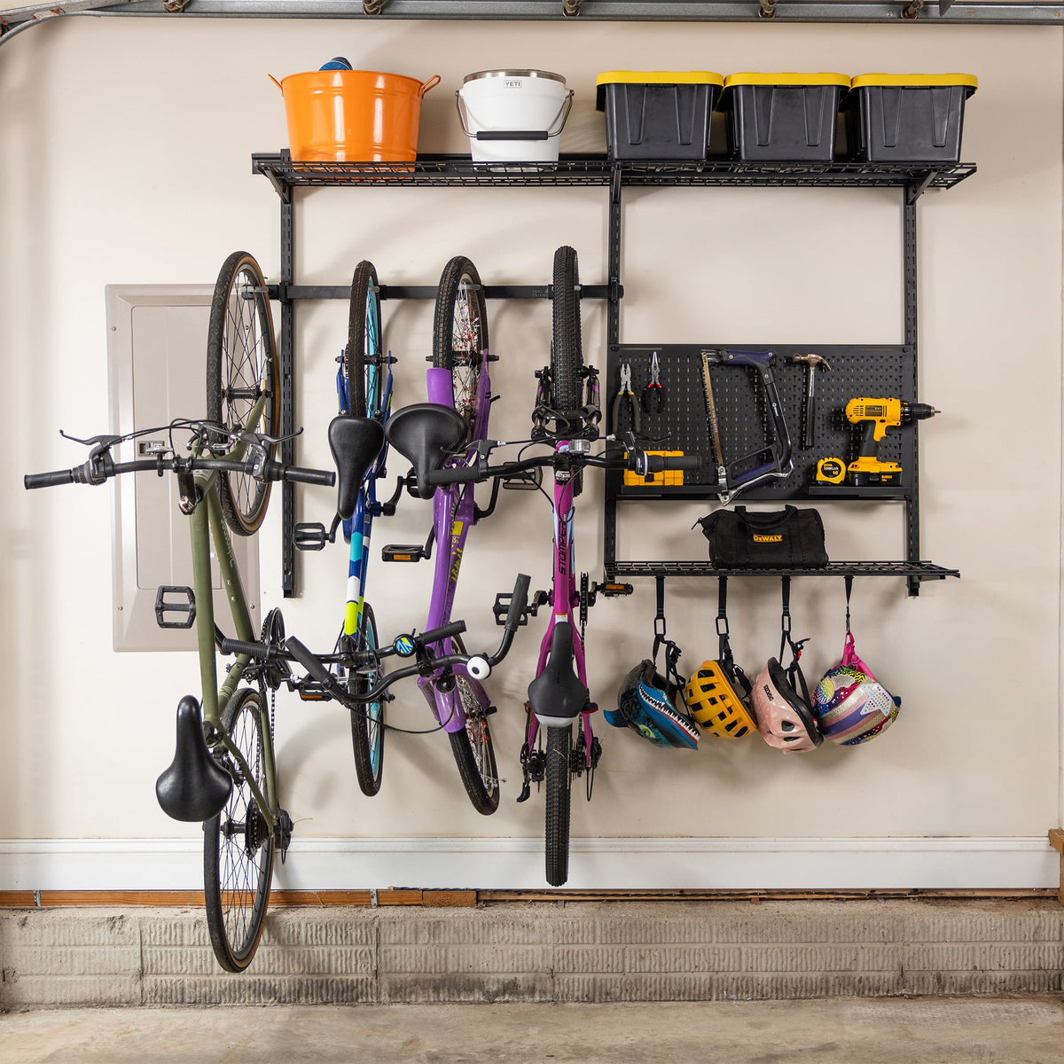 G-Storage Pro wall system with bikes, pegboard, bins and helmets