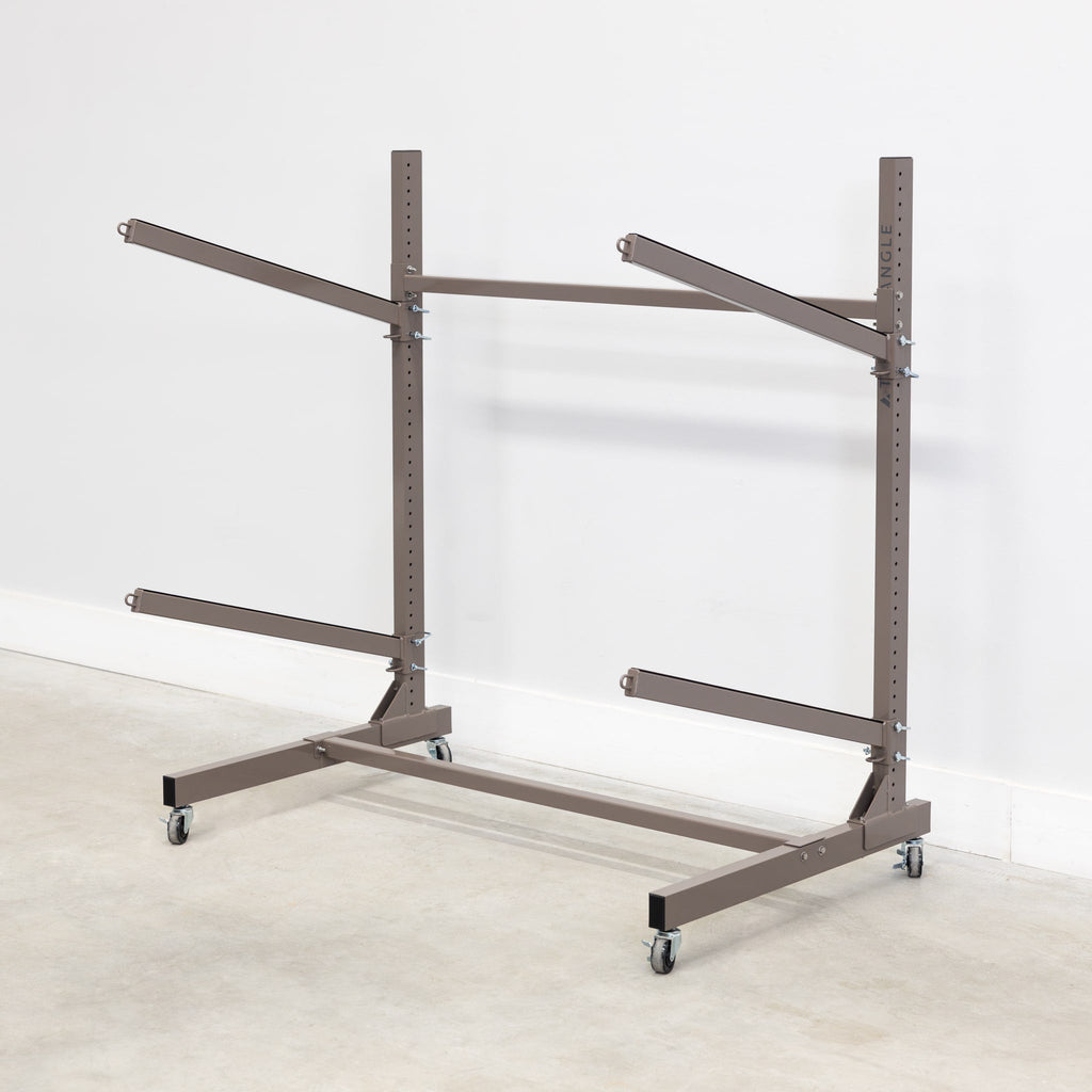 Empty mud-colored 2-level kayak rack with wheels