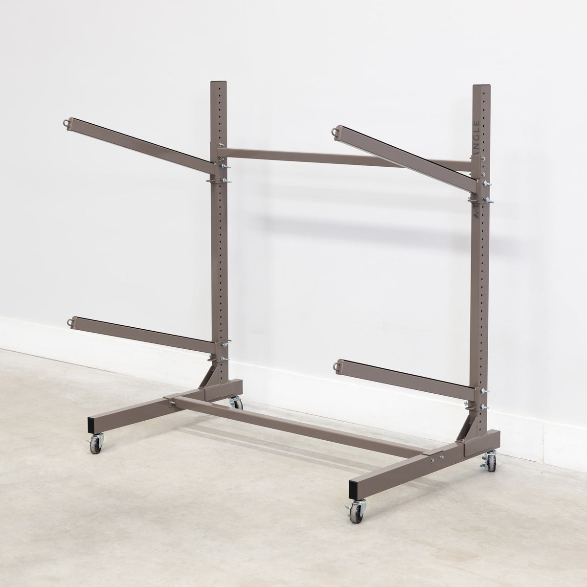 Empty mud-colored 2-level kayak rack with wheels