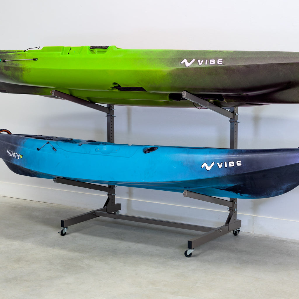 Two kayaks on the mud-colored 2-level rolling kayak rack