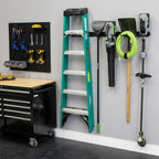 48-inch wall organizer holding a ladder, shovels, a hose and yard tools beside a workbench