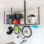 4 x 8 ft overhead ceiling rack with bins and a cooler, with a bike and helmet hanging from hooks below
