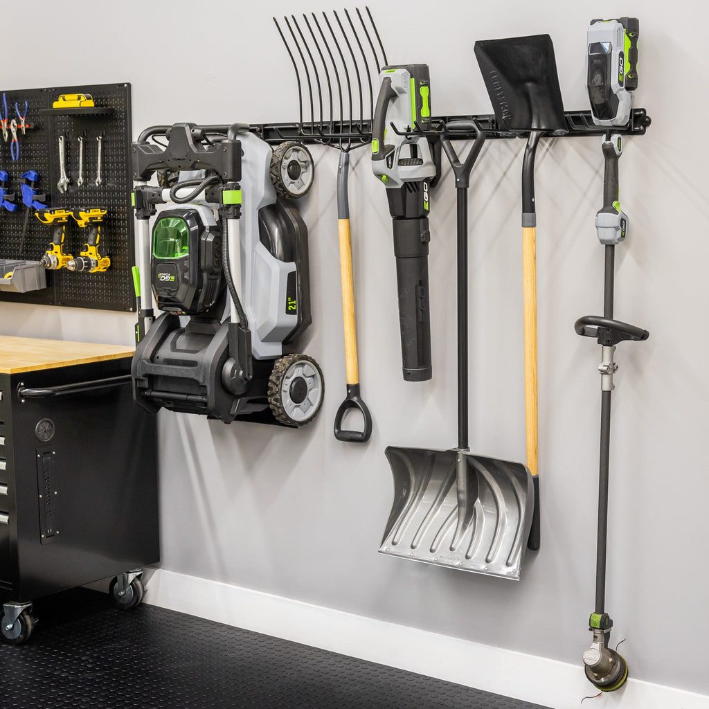 64-inch wall organizer holding a lawn mower, rake, leaf blower, shovel and trimmer
