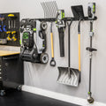 64-inch wall organizer holding a lawn mower, rake, leaf blower, shovel and trimmer