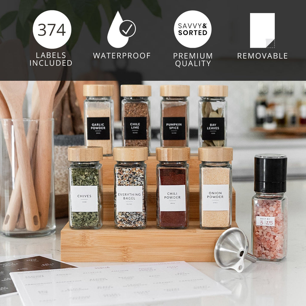 Labeled square spice jars on a wooden riser; 374 waterproof, removable labels