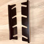 Empty black skateboard wall organizer