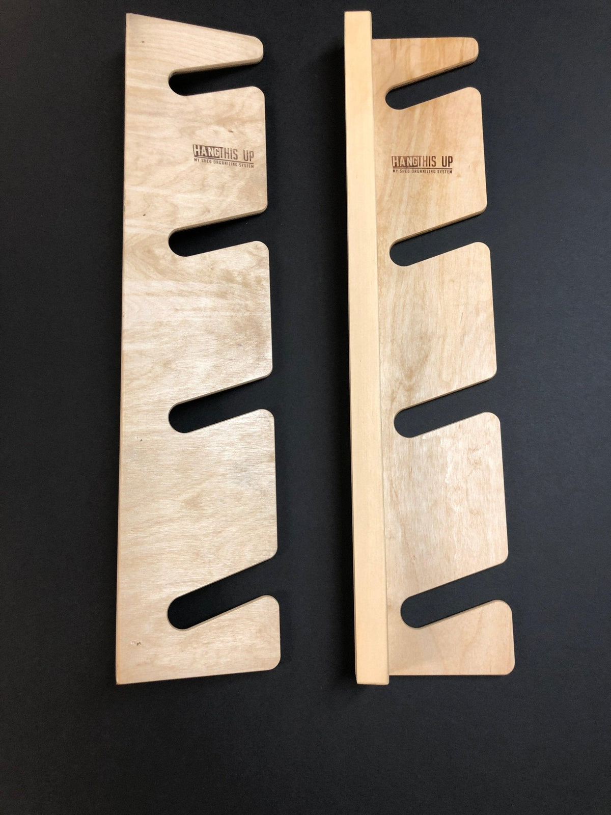Empty natural wood skateboard wall organizer