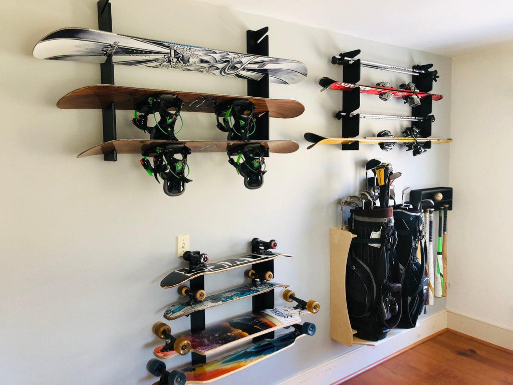 Wall of snowboard, fishing rod and skateboard racks