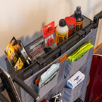Close-up of accessories stored in the gray rack pouch pockets