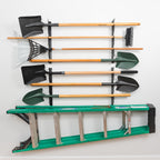 8-level wall tool organizer holding shovels, rakes, a broom and a ladder