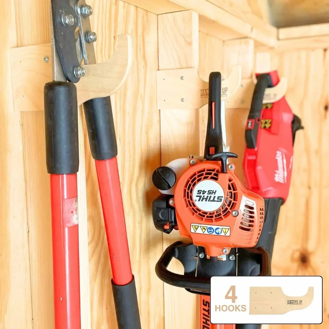 Wood hooks holding loppers and a hedge trimmer; 4 hooks included