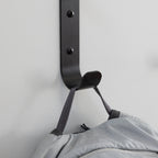 Close-up of a Crozet hook holding a bag strap
