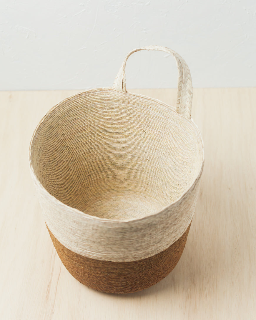 Top view of the Copper Prado basket showing its open interior and hanging loop