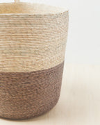Close-up of the natural and Pewter palm weave on a Prado basket