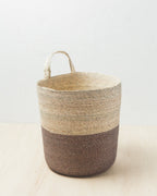 Pewter Prado palm basket showing its natural upper section and dark lower section