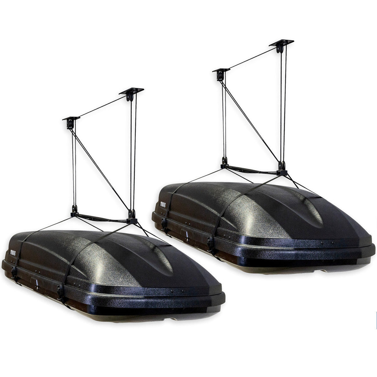 Two cargo boxes each held by a ceiling hoist