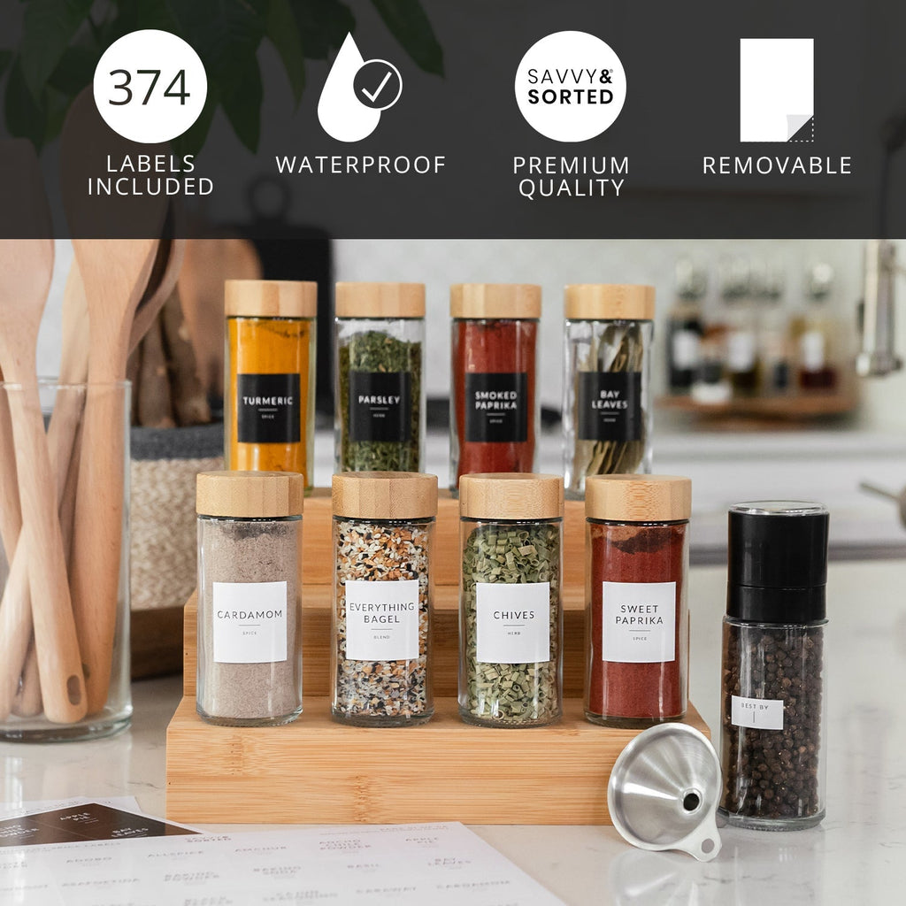 Labeled round spice jars on a wooden riser; 374 waterproof, removable labels