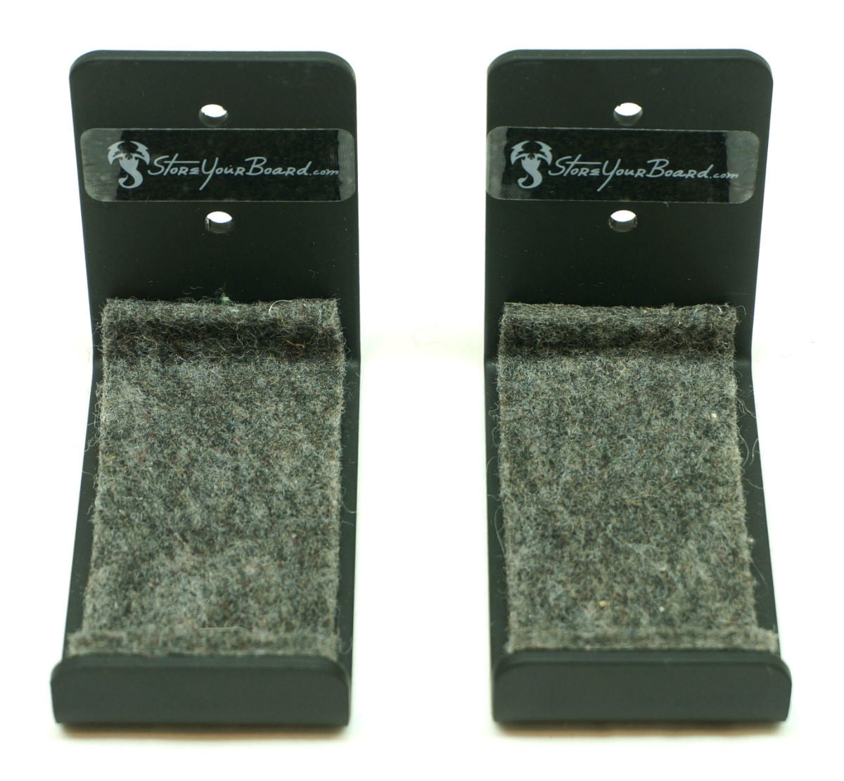 Front view of two medium minimalist wall hooks with felt padding