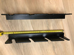 Black ski rack rails with a tape measure showing their length