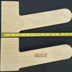 Two wood step ladder rack pieces with a ruler showing their length