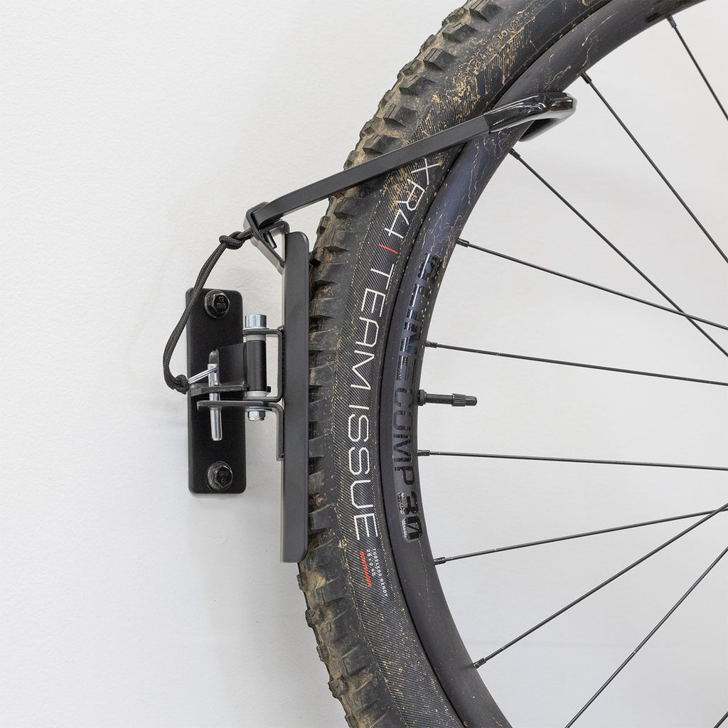 Close-up of a tire held by the swivel hook