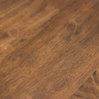 Close-up of the dark wood workbench top grain