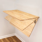 Natural wood workbench shown open and folded