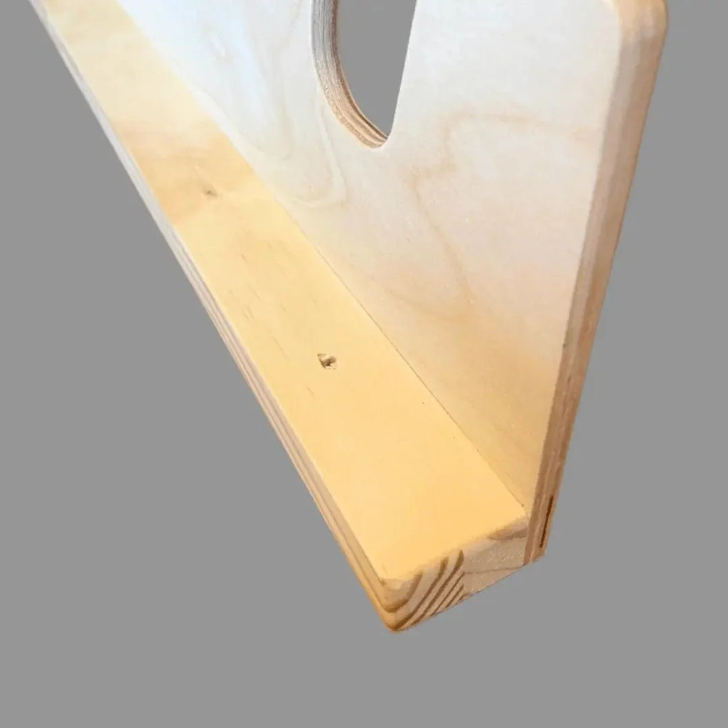 Close-up of a garden tool rack slot