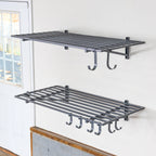 Two empty gray 2 x 4 ft wall shelves with hooks underneath