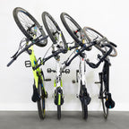 Four bikes hanging on WheelRest hooks, front view
