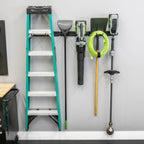 Ladder, leaf blower, hose and trimmer hung on the 48-inch wall organizer